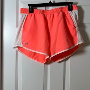 Under Armour Heatgear Size Medium athletic shorts orange and white